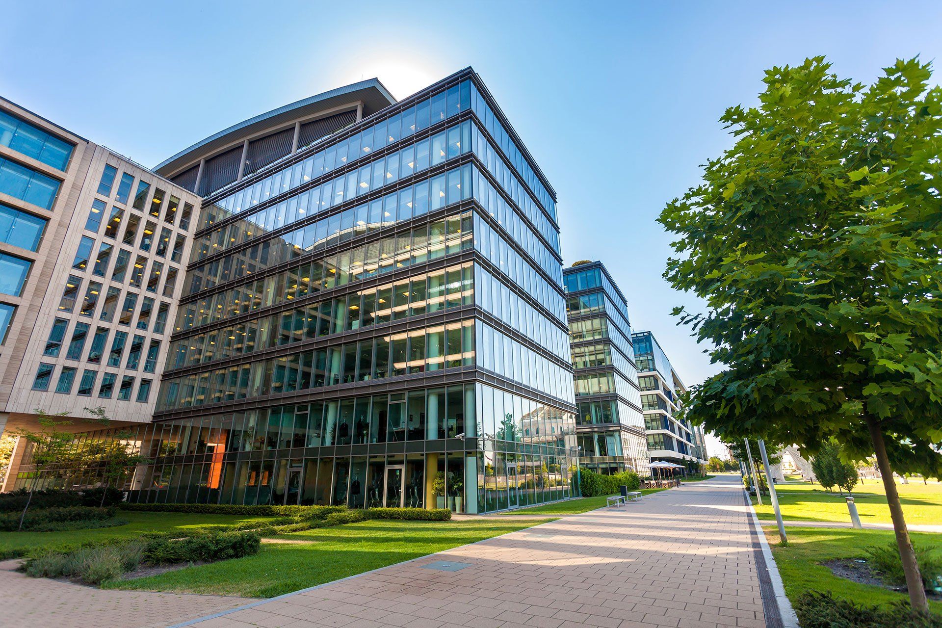 a large commercial building with glass windows