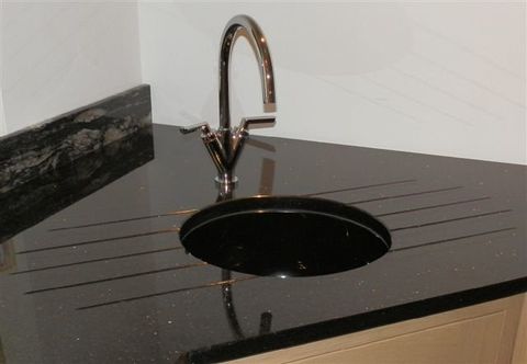 Black Granite Circular Sink to contrast with Star Galaxy Granite Worktop