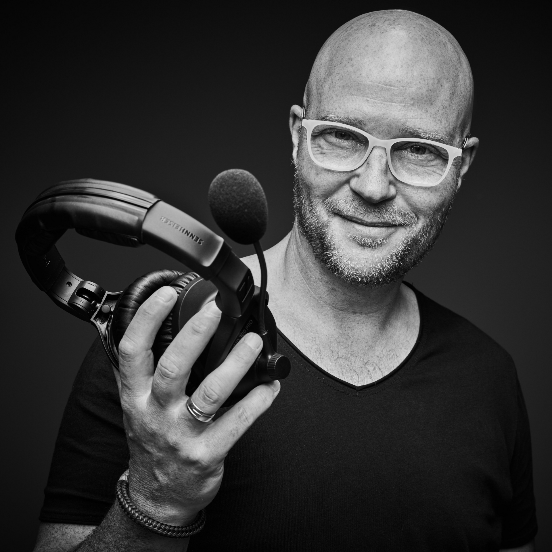 Foto Audiograf Ingo Stoll, Profil mit Headset (Sennheiser)