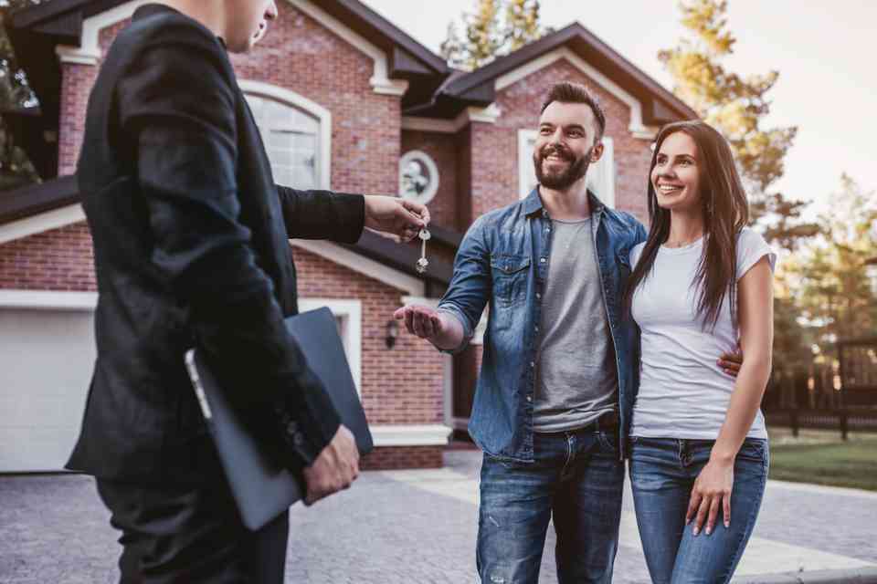 a couple buying a house