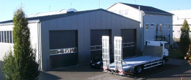 company hall with three sliding gates