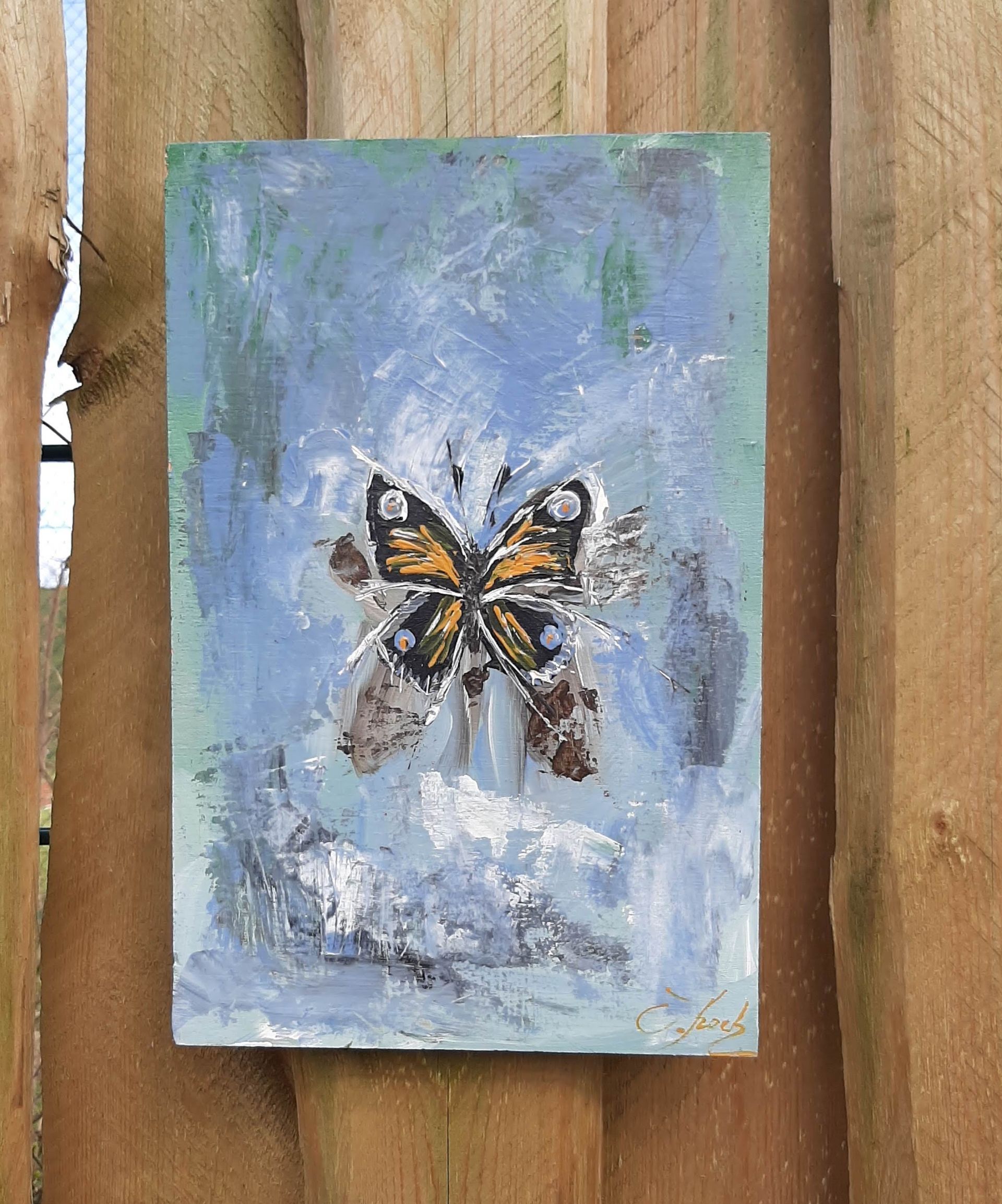 ein handgemalter Schmetterling auf Multiplex gemalt und wetterfest lackiert.