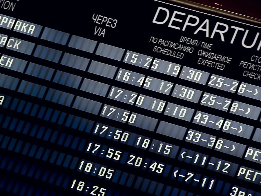 airport departures ticker close up