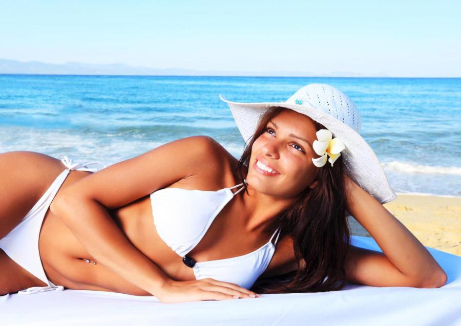 woman reclining on the beach