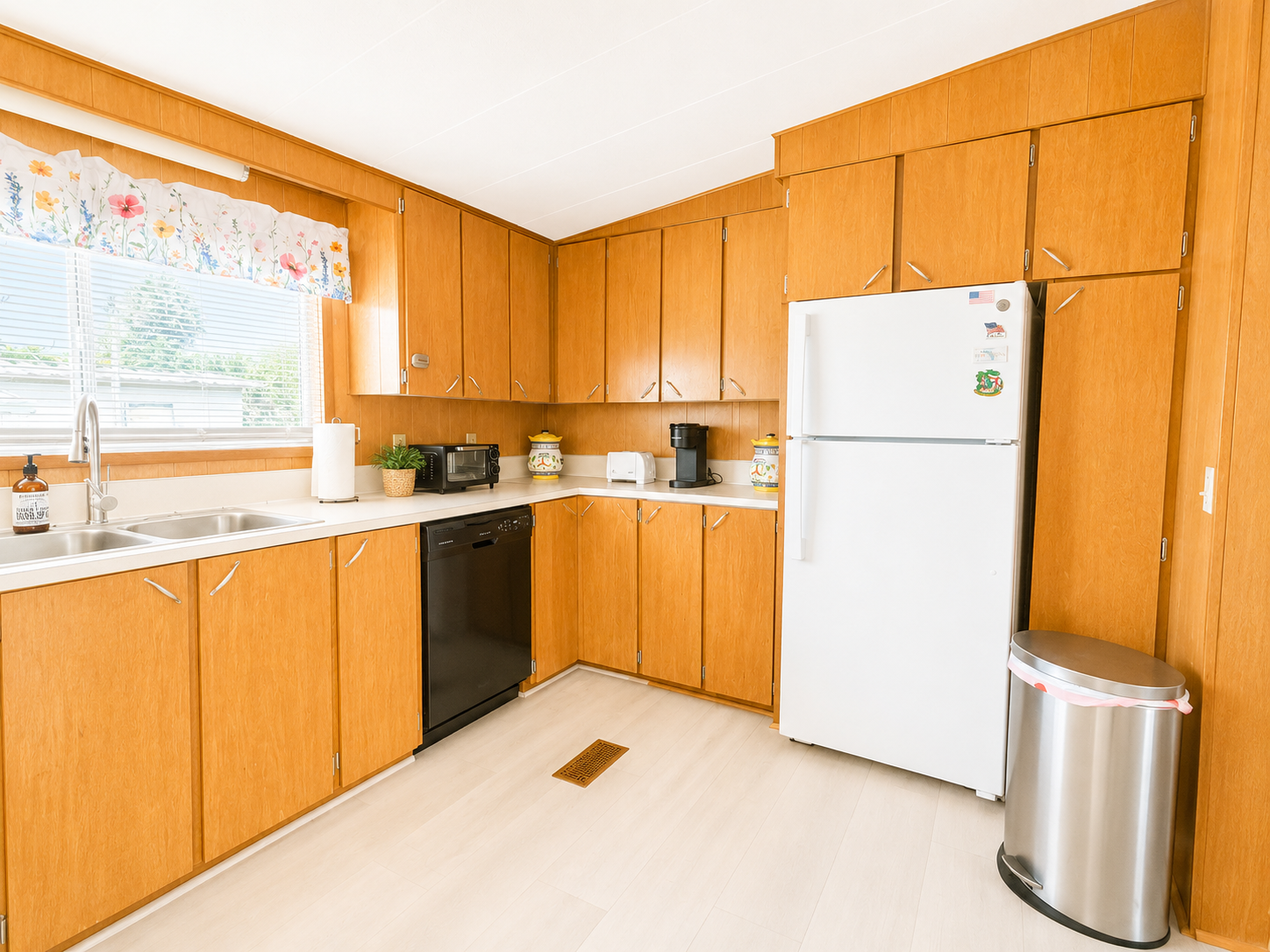 Classic Florida mobile home kitchen with spacious cabinet storage