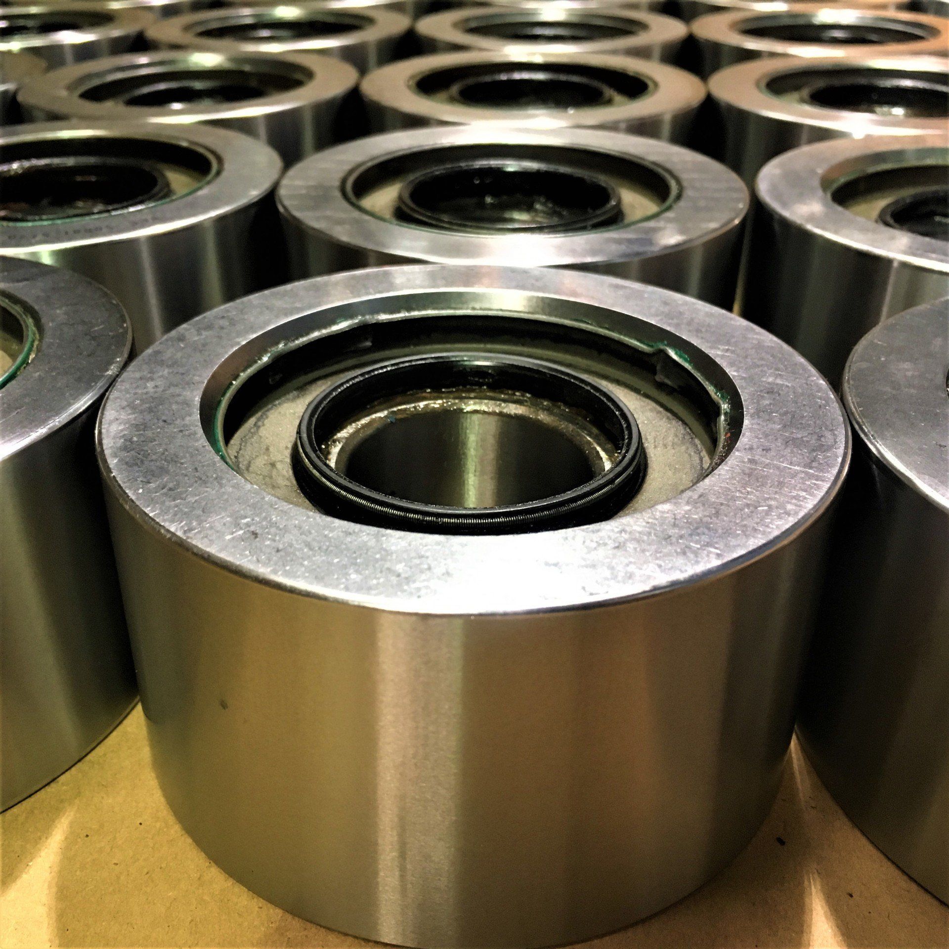 cylindrical grinding of back up rolls from sheet metal processing machine