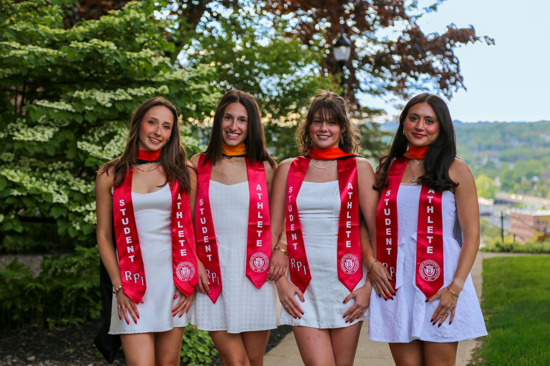 Natural light graduation portraits on college campus at RPI