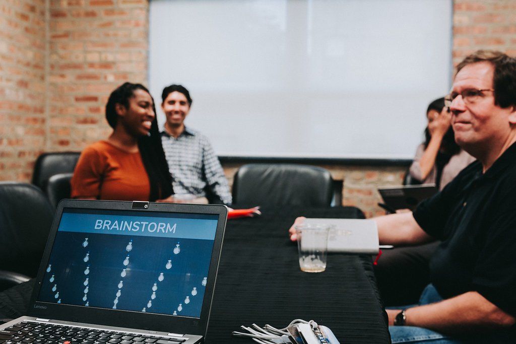 Meeting at University CoWork conference room / boardroom / meeting room / Zoom Room.