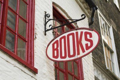 bookstore with red lettered sign that says 