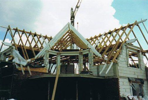 Neubau mit 3 Satteldächern und Ausbauten