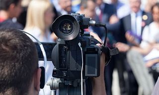 Man videotaping an event