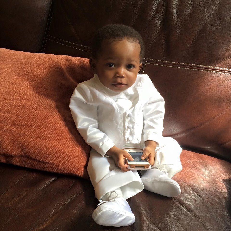 Little boy in a white tux