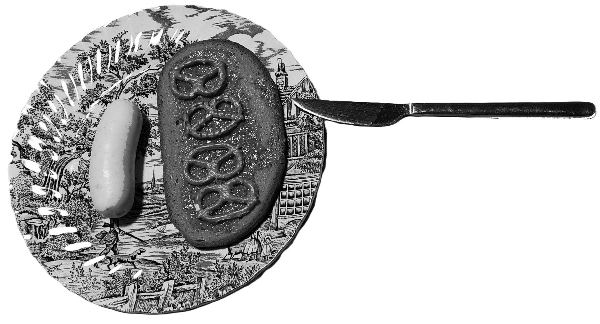 Ein Teller, auf dem eine Weißwurst und eine Schnitte Brot mit Brezeln zu sehen ist. Daneben liegt ein Messer.