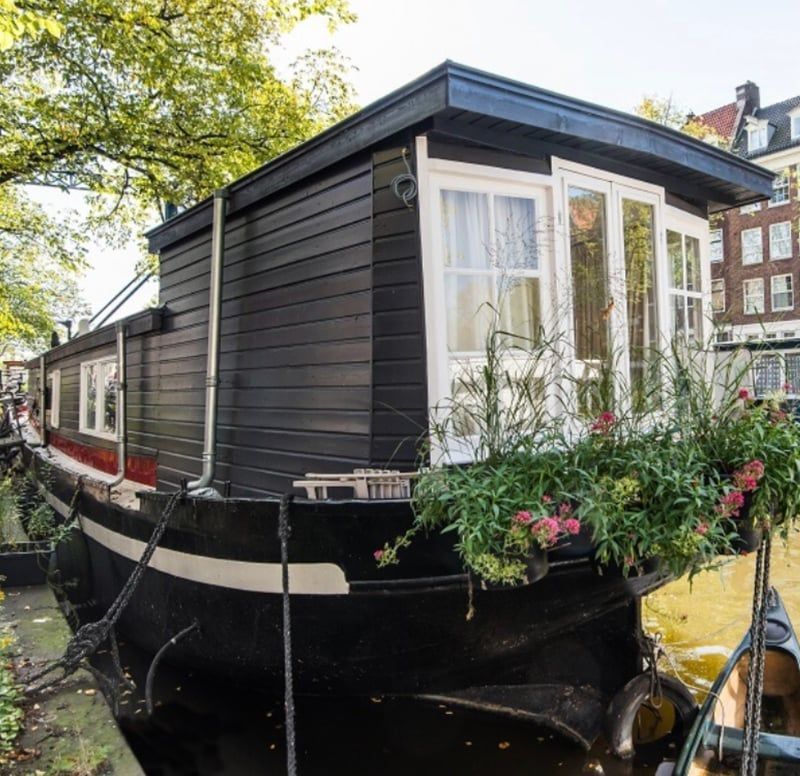 Herzblut Amsterdam Stadtführungen, auf deutsch, kleine Gruppen. Privatführungen. Fahrradtouren. Hausboote.