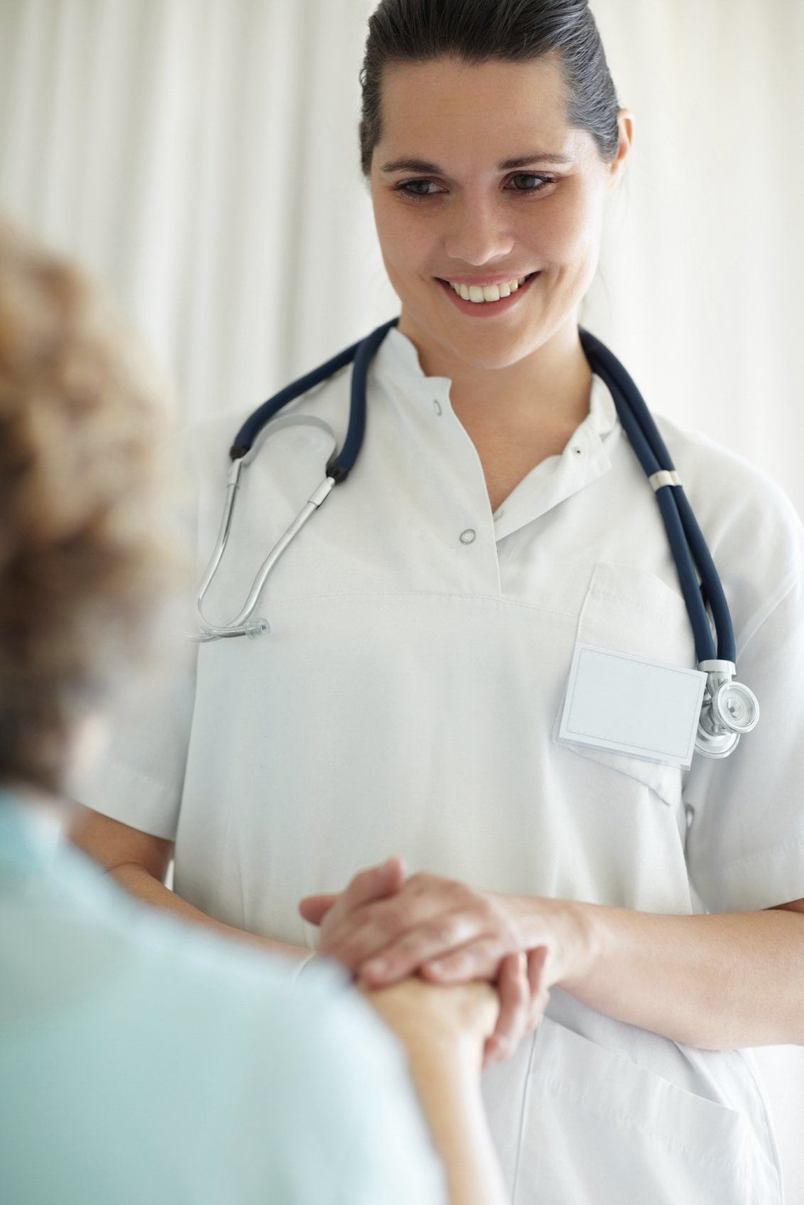 Nurse wearing a stethoscope.