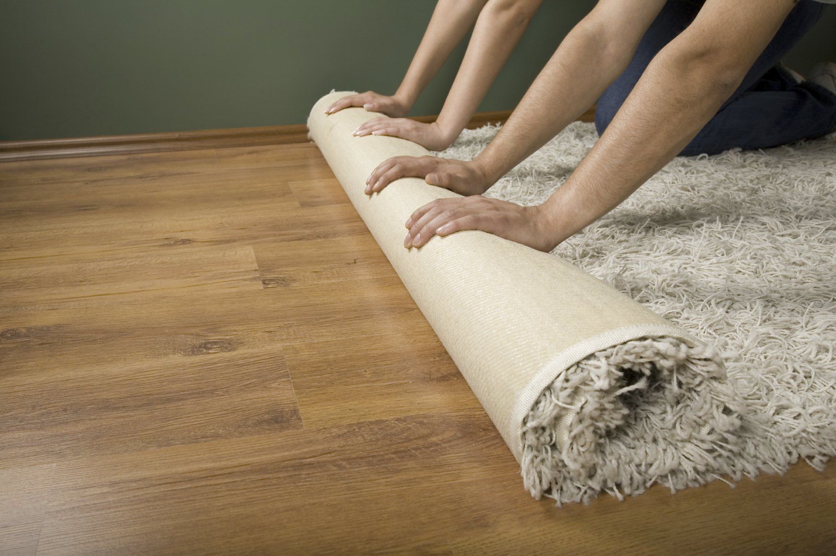 Putting a carpet on wooden floor