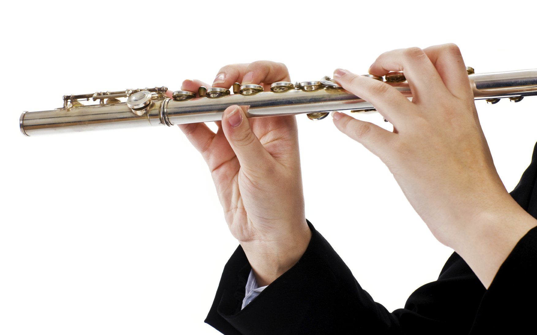 Hands of musician playing the flute.