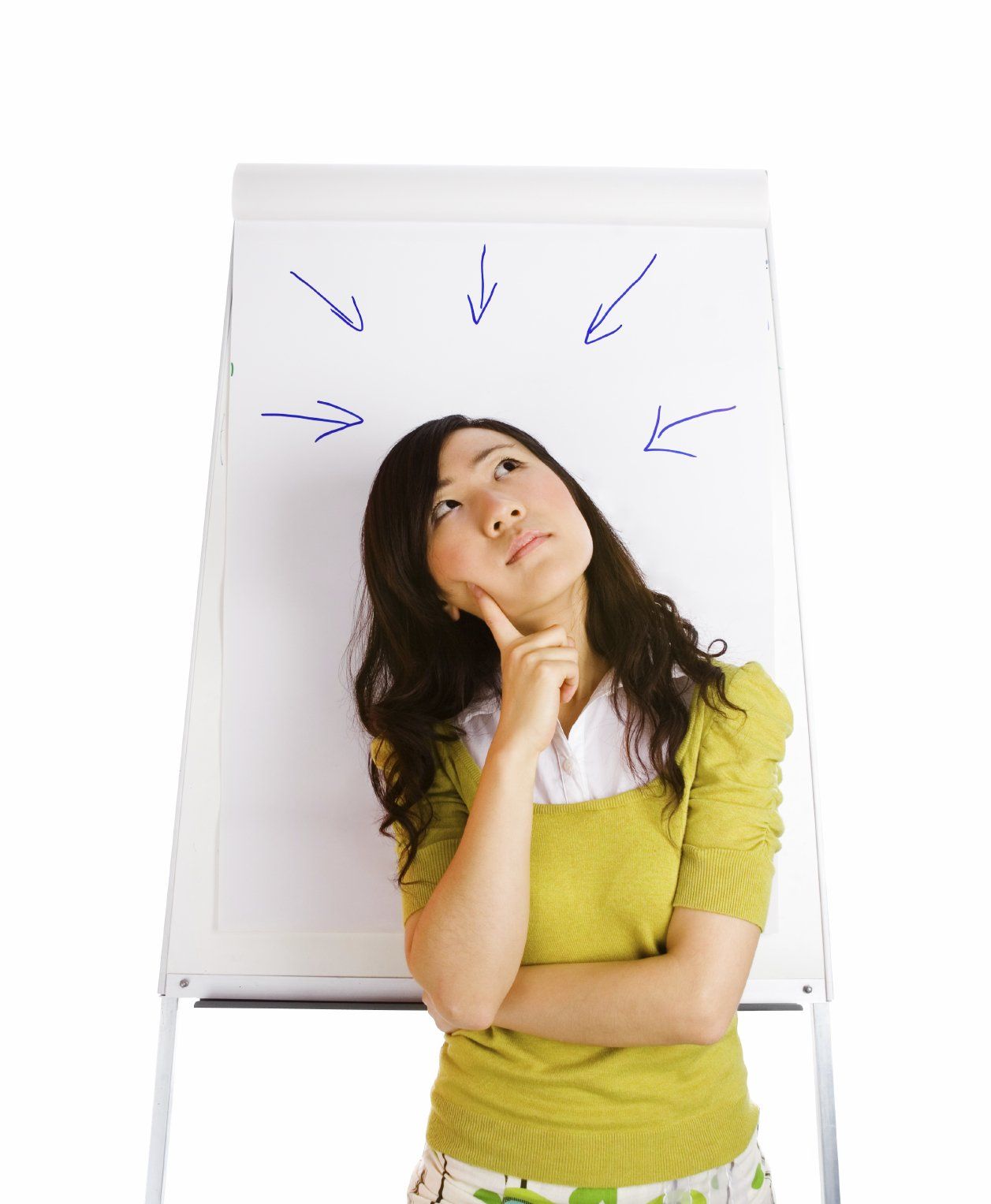 Young, Asian woman with black hair, standing in front of a white board, in deep contemplation