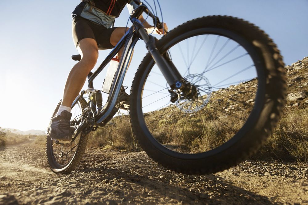 Riding a mountain bike in a canyon