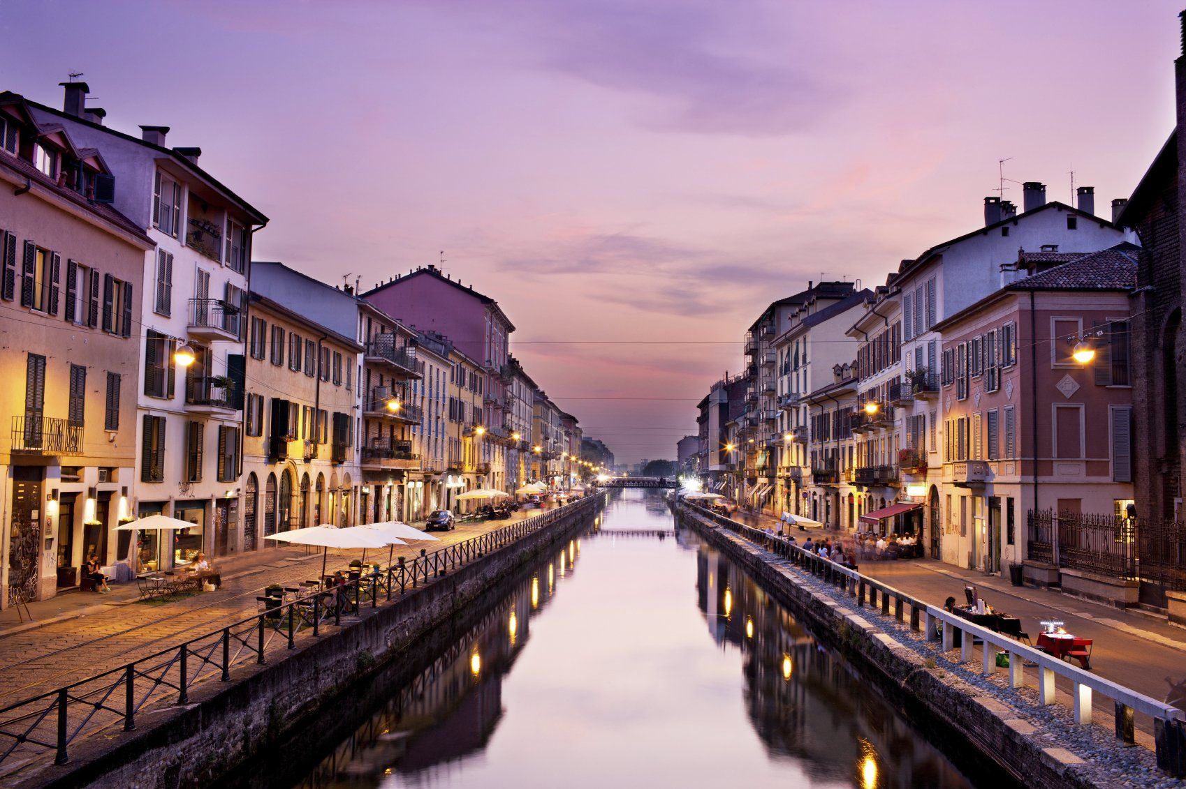 A perspective view of a canal in Venice; with buildings on both banks.