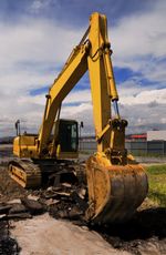 Land und Baumaschinen Bagger mit einem langen Arm und einer Schaufel