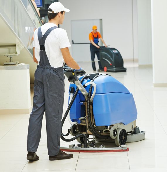 a person mopping a floor