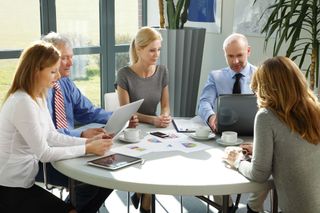 Group of business people working together on a project