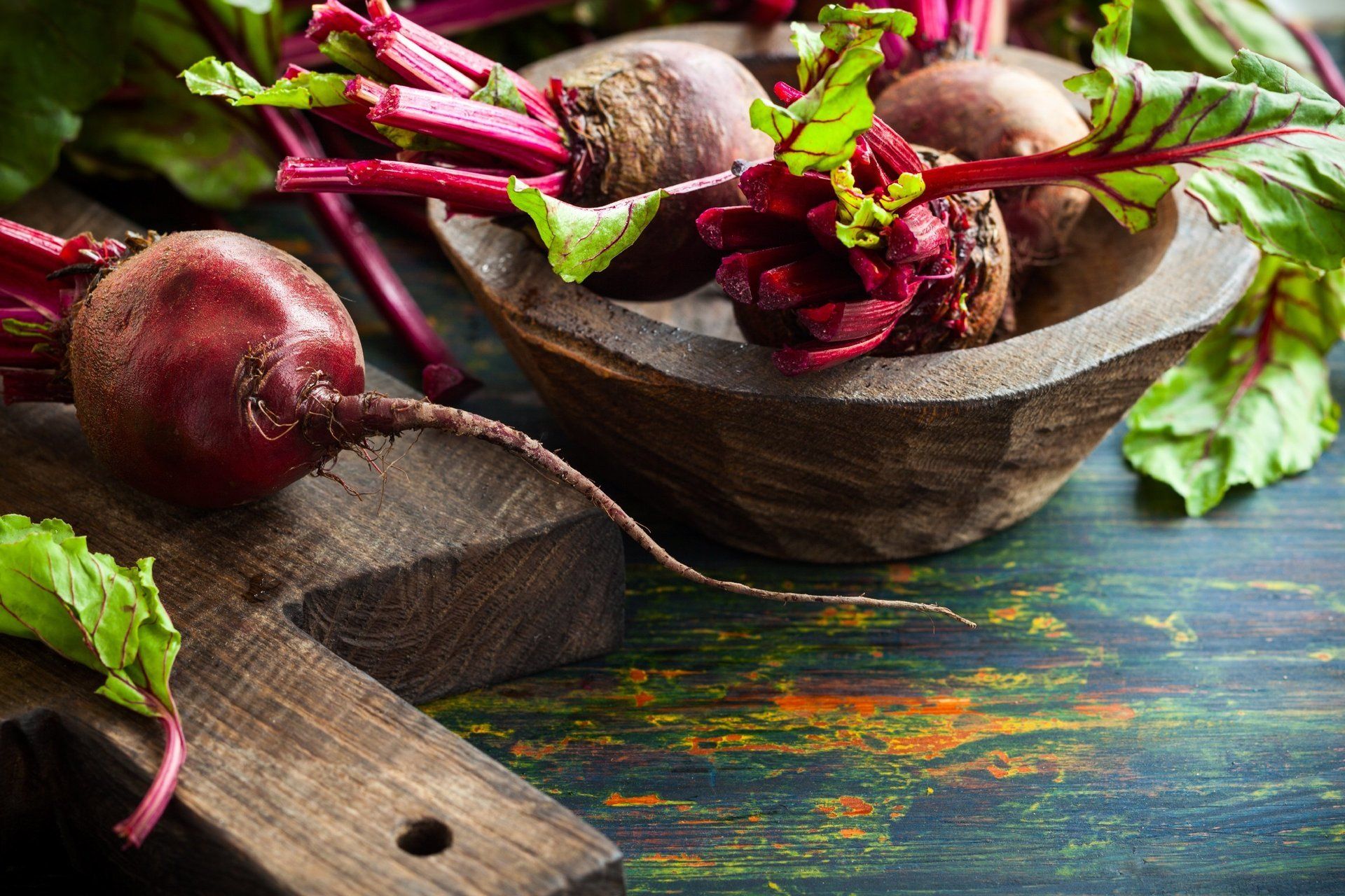 A just-harvested batch of beets, sitting on a table