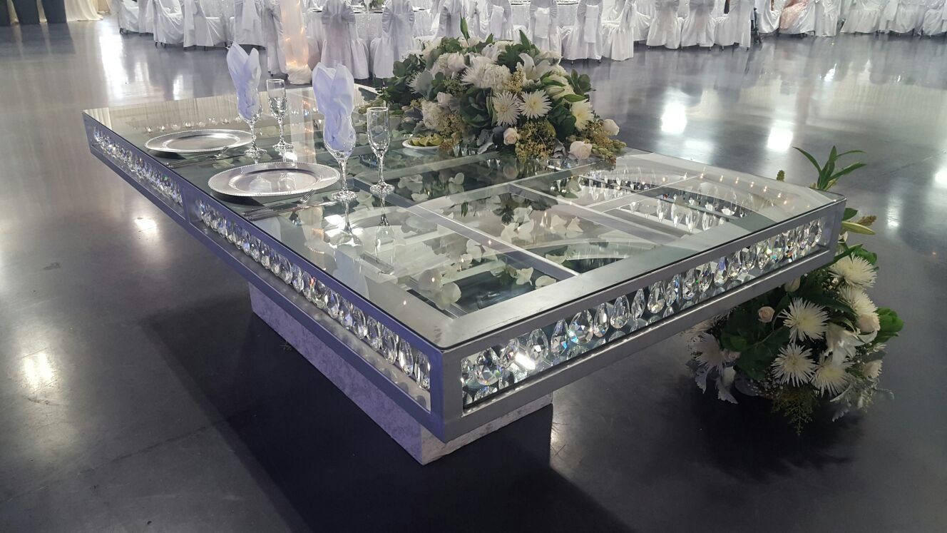 An image of a speciality table with a display glass that can show items inside.