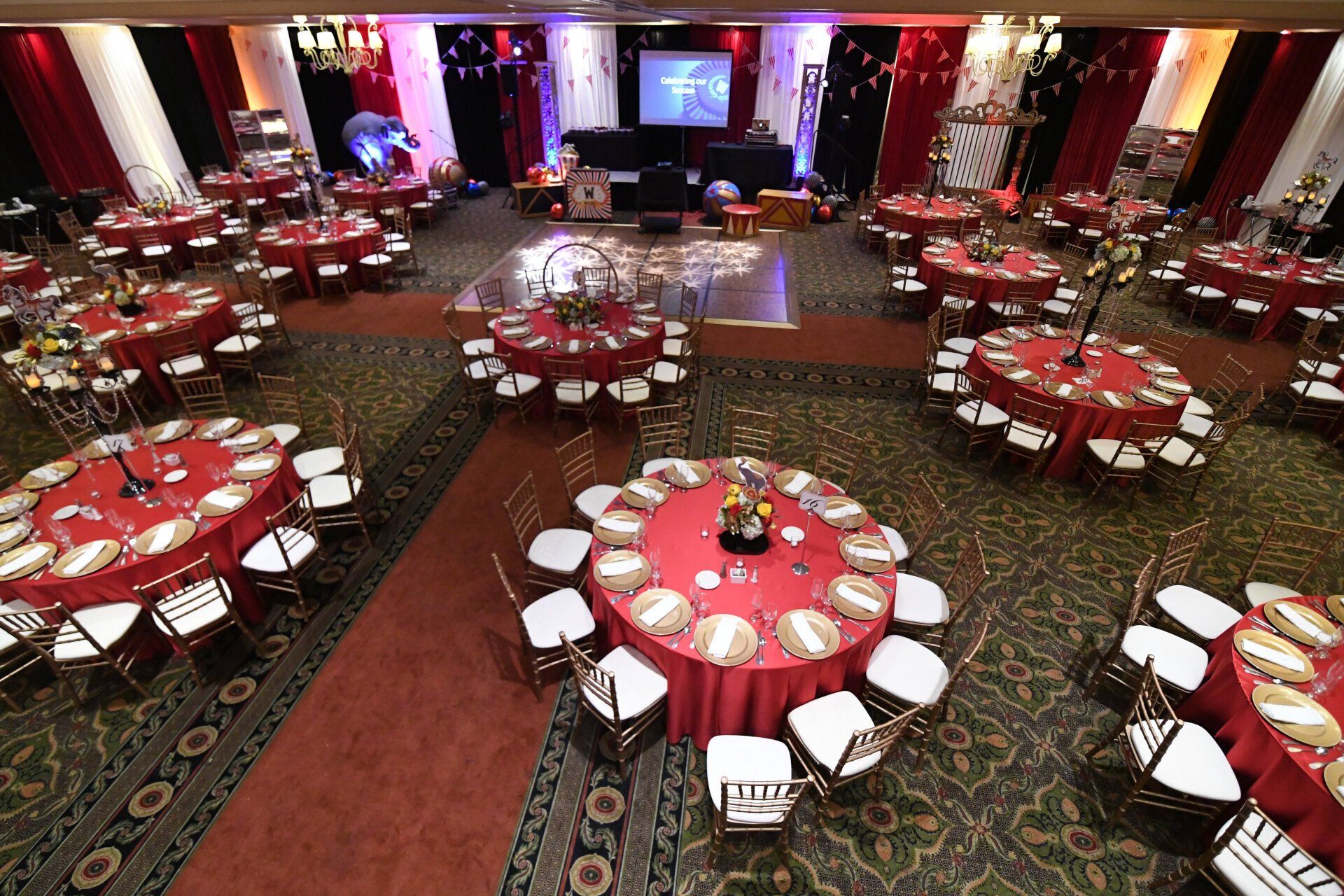 An image of Waba Grill's corporate event with accentuates the grand hall and specialty tables.