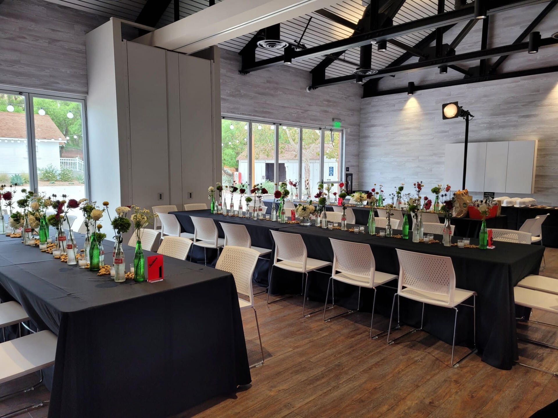 An image of an indoor rectangular specialty table installation.