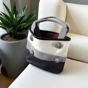 Henkeltasche Handtasche grau weiß schwarz Abendtasche