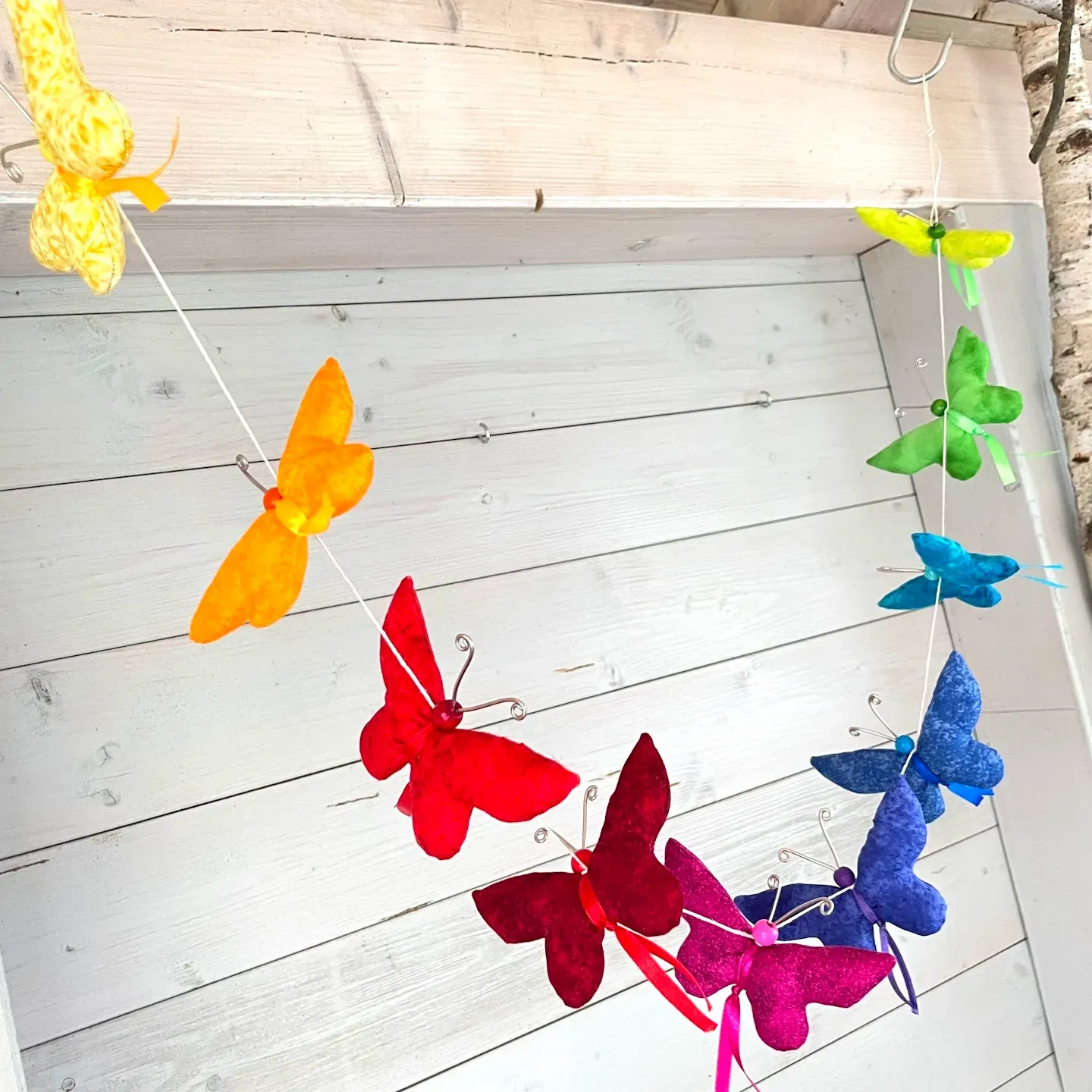 Schmetterlingsgirlande regenbogenfarben kaufen