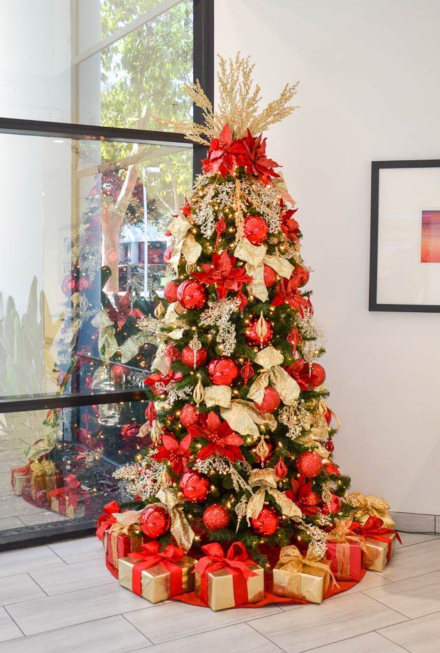 red and gold  theme decorated christmas tree rental