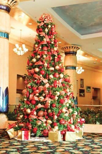 red and gold decorated commercial christmas tree