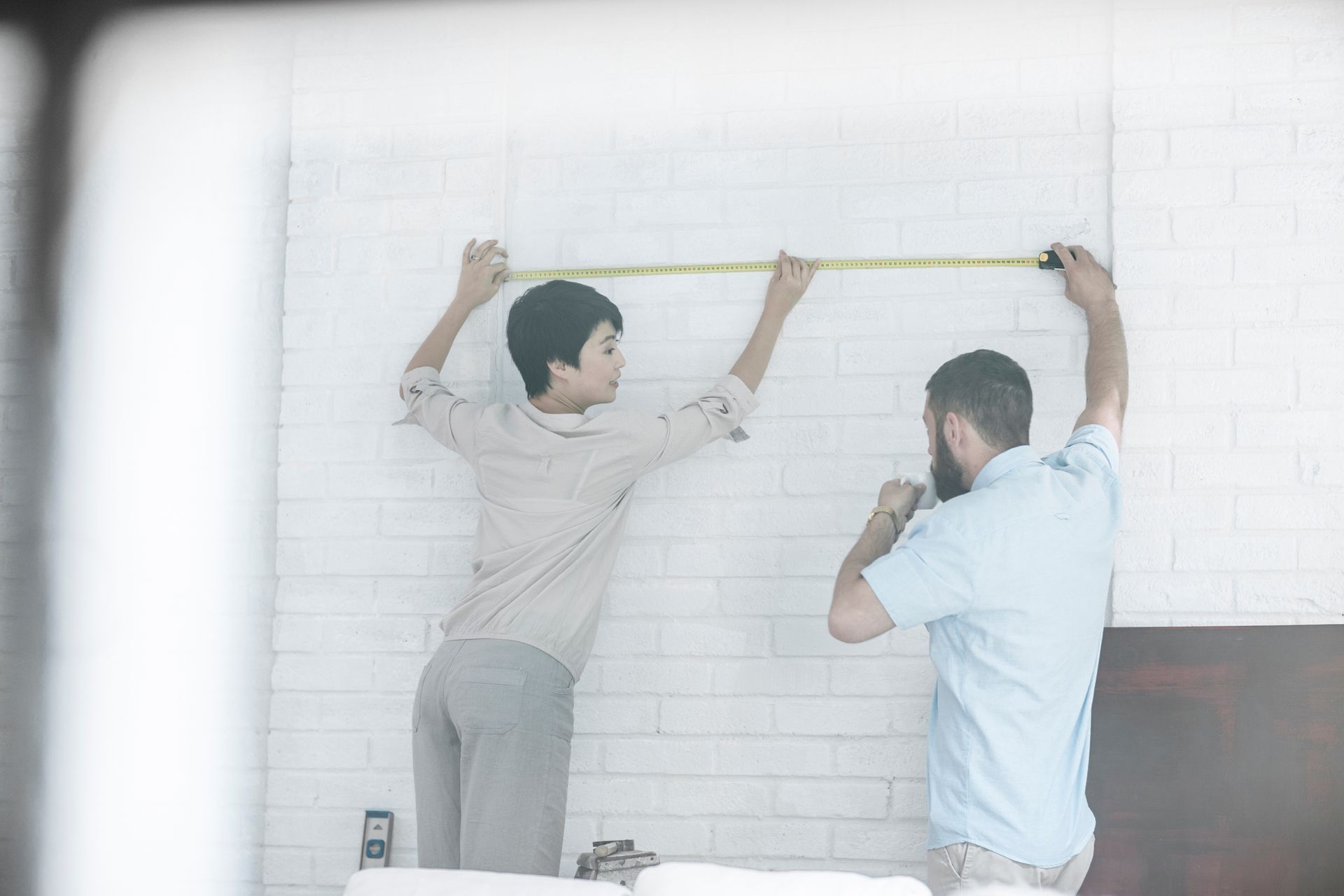 Leave the headache of hanging complicated picture groupings to the professional! How to hang a picture grouping, Lubbock Texas Picture Hanging. Picture Hanging Near Me