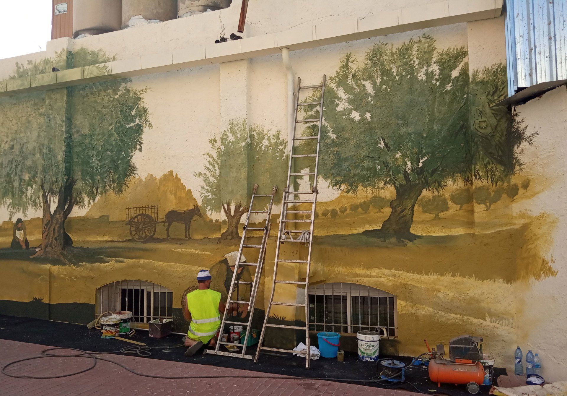Pintura mural para la fachada del Molí d'Oli en Olesa de Montserrat
