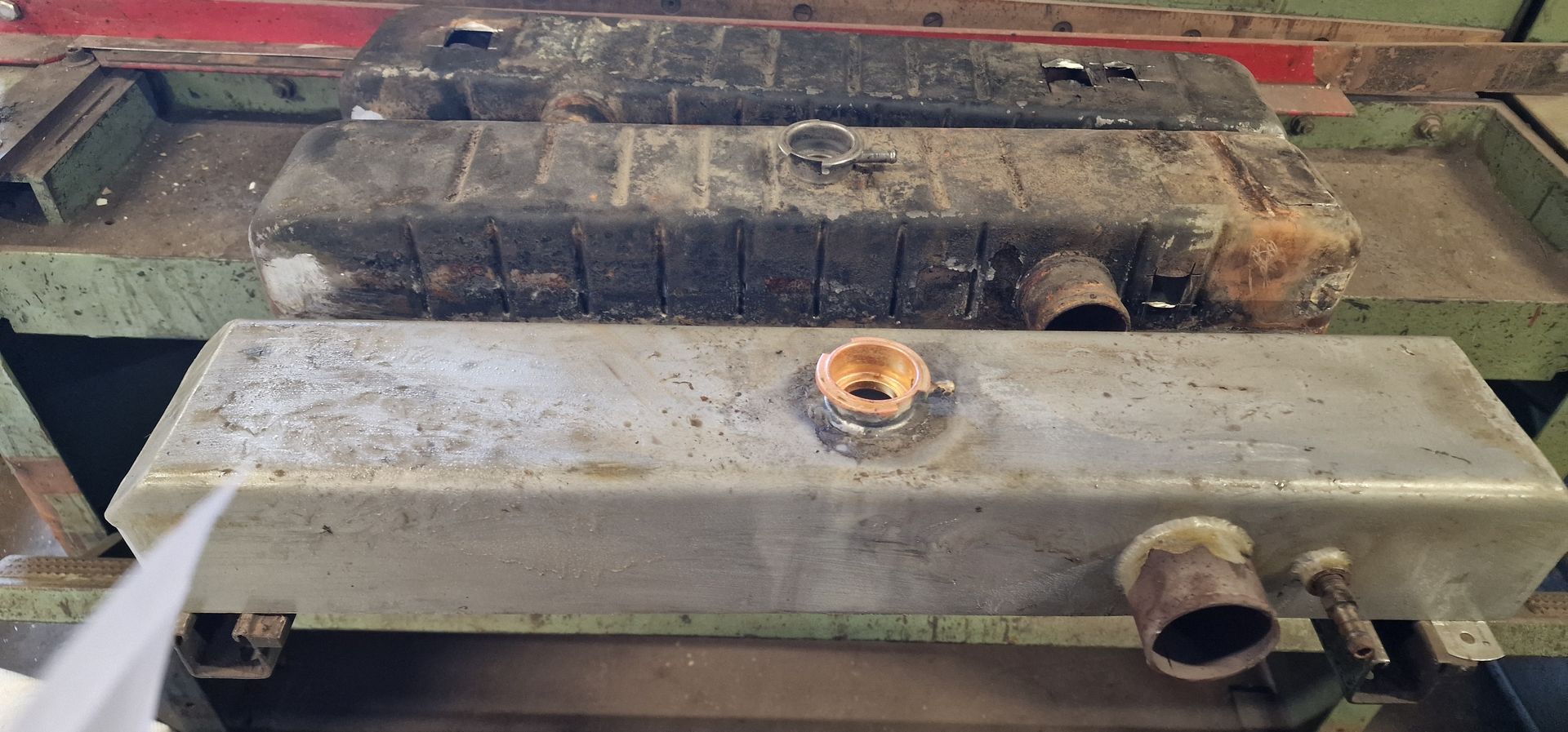 Header tank remanufacture