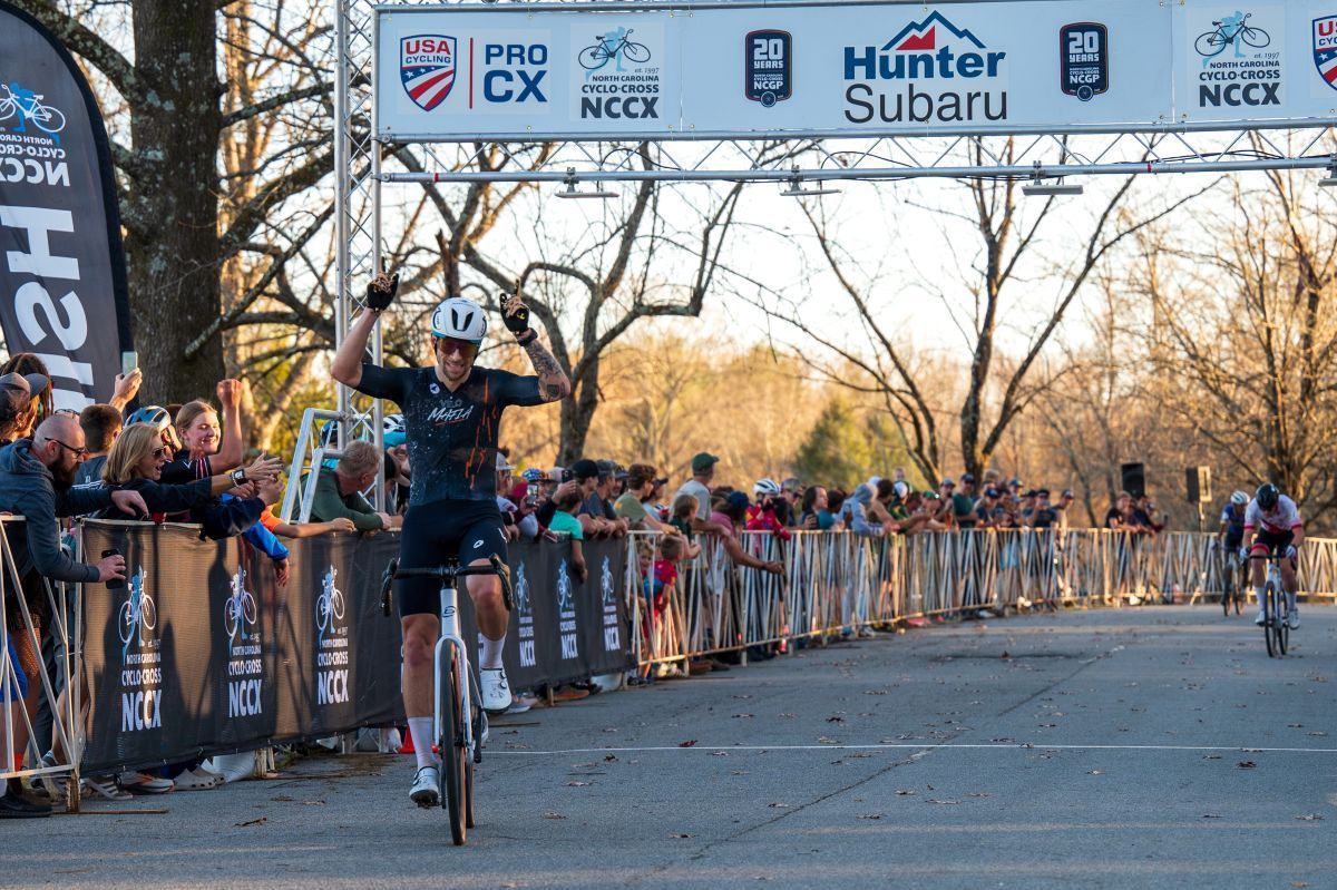 A cyclist rides across a finish line. All photos by Jamie Arkfeld Photography. Used by permission.