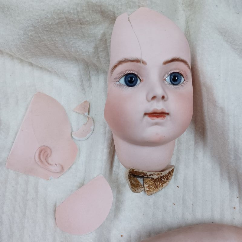 tête de la poupée ancienne Bru cassée