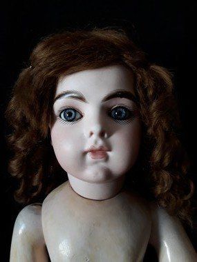 Etapes de restauration d'une poupée Bru