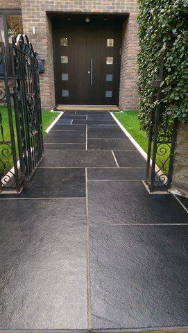 London Garden Builders design Black limestone front path. Garden  in Crystal Palace