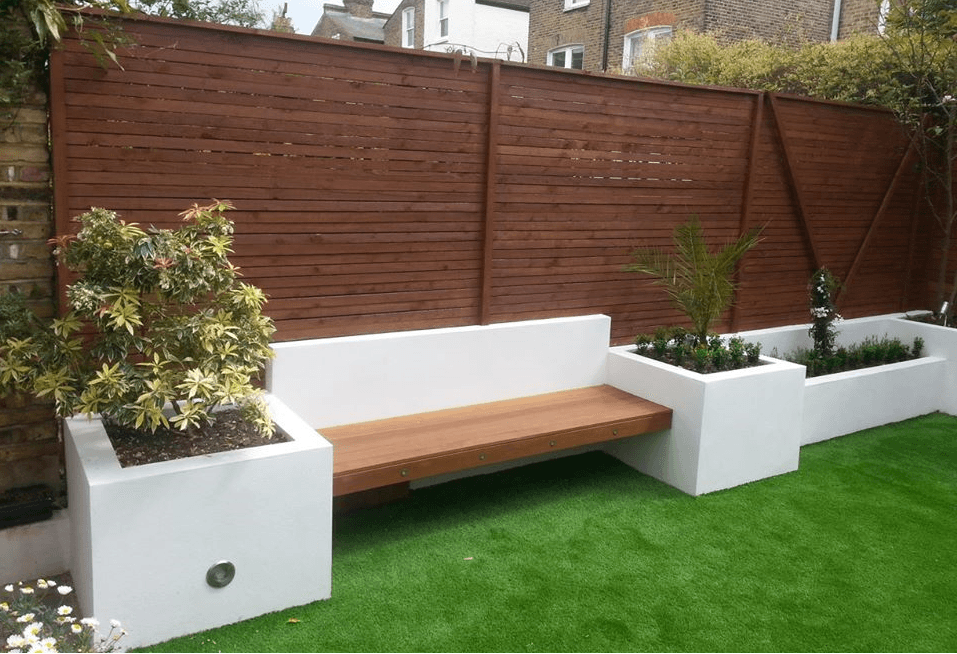 London Garden Builders design softwood trellis fencing hardwood bench retaining beds artificial lawn
