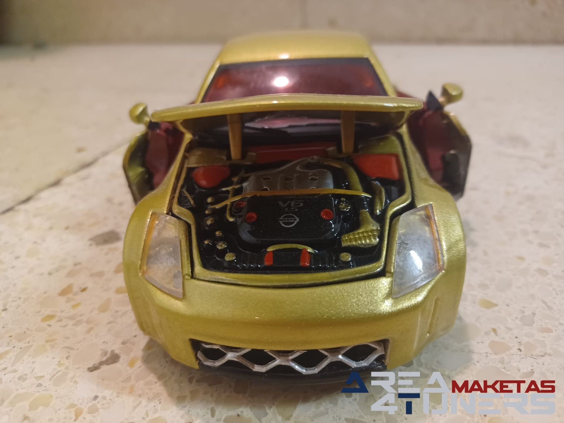 Reportaje maqueta coche Tuning Nissan 350z Explicit Pickup Imagen perteneciente al reportaje de la revista Area4tuners.es sobre una maqueta de coche Tuning 1:24 Nissan 350z Explicit Pickup