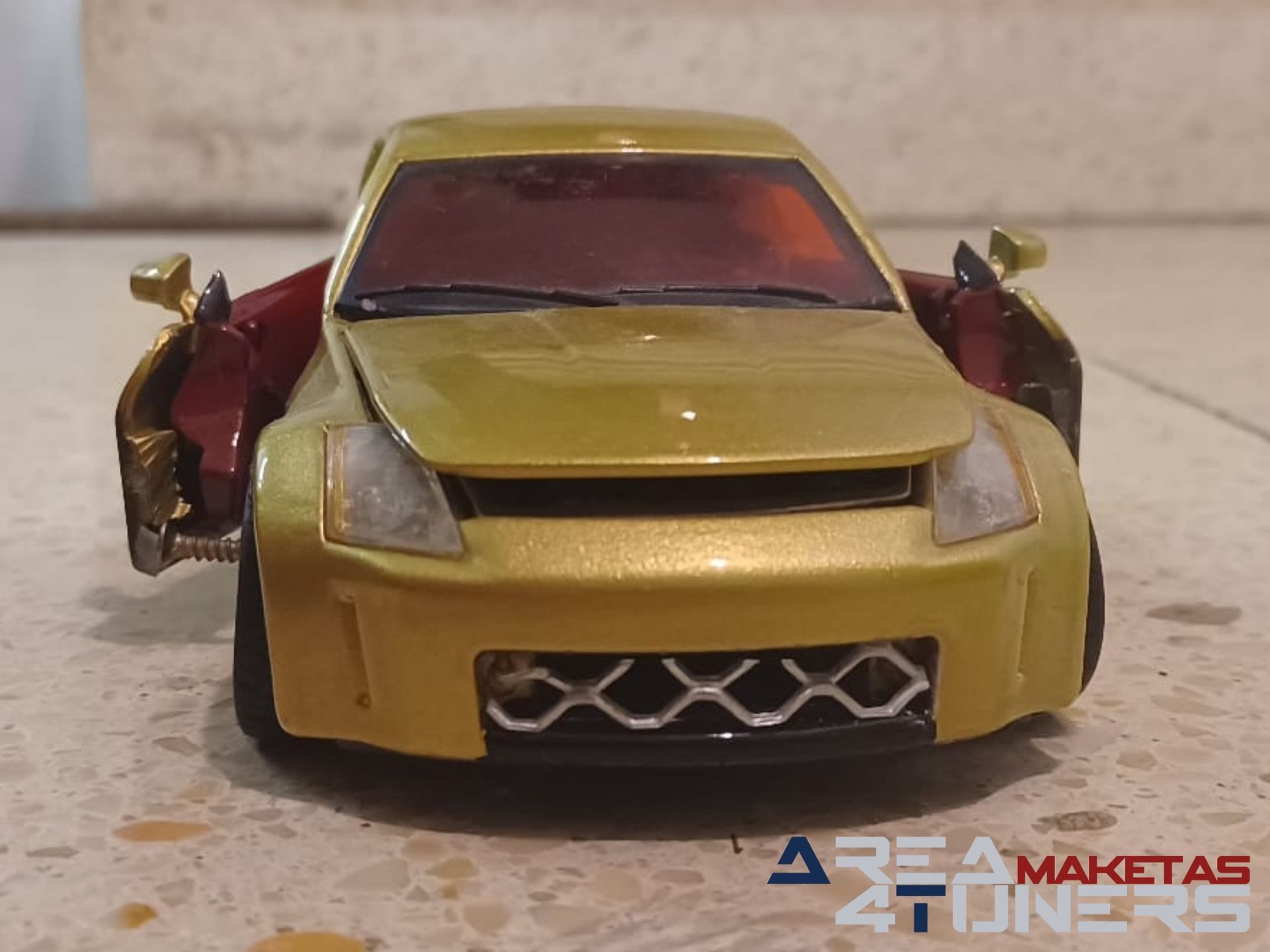 Reportaje maqueta coche Tuning Nissan 350z Explicit Pickup Imagen perteneciente al reportaje de la revista Area4tuners.es sobre una maqueta de coche Tuning 1:24 Nissan 350z Explicit Pickup