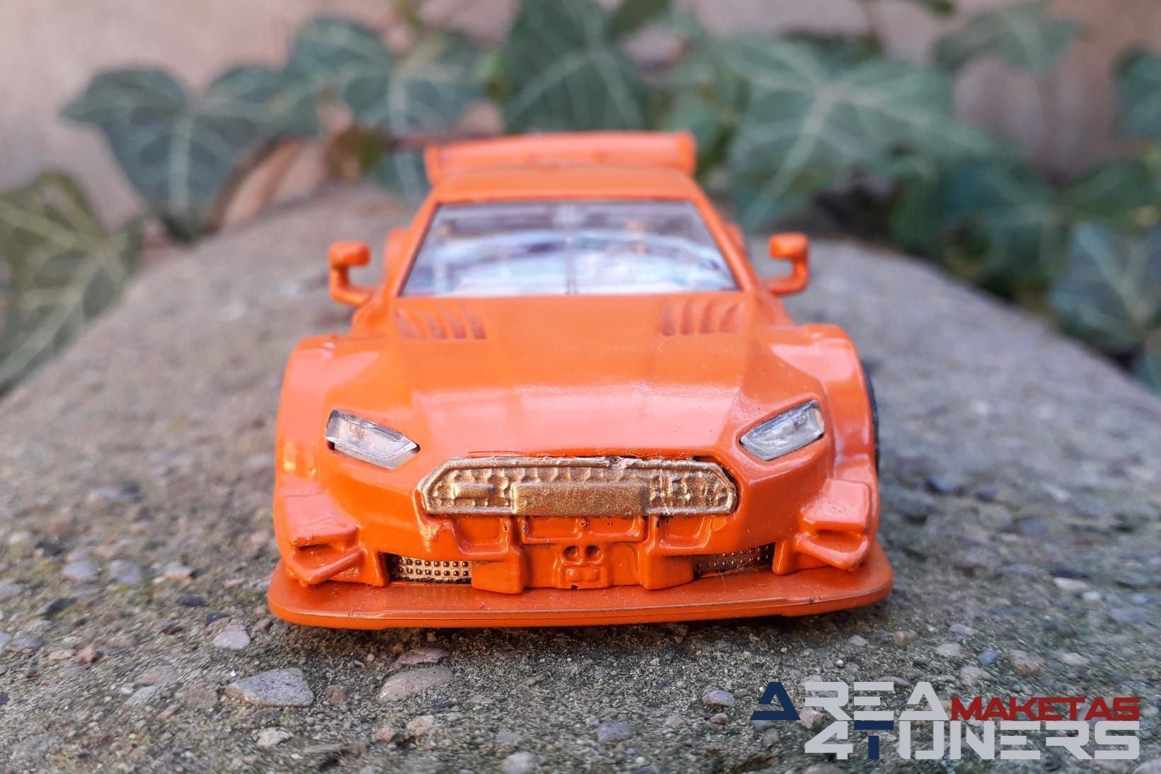 Reportaje maqueta Tuning Audi Rs5 Clockwork Orange Imagen perteneciente al reportaje fotográfico de la revista Tuning de publicación diaria Area4tuners.es sobre una maqueta Tuning 1:44 Audi Rs5