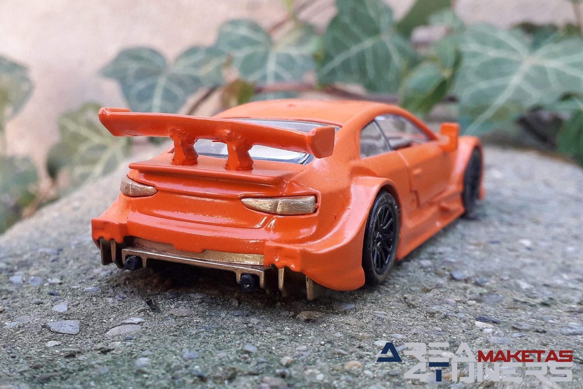 Reportaje maqueta Tuning Audi Rs5 Clockwork Orange Imagen perteneciente al reportaje fotográfico de la revista Tuning de publicación diaria Area4tuners.es sobre una maqueta Tuning  1:44 Audi Rs5