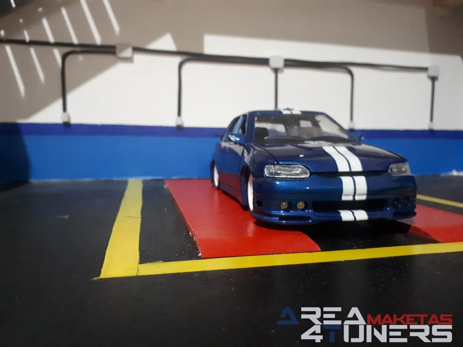 Reportaje maqueta Tuning Ford Escort Little Ocean Imagen perteneciente al reportaje fotográfico de la revista Tuning de publicación diaria Area4tuners.es sobre una maqueta Tuning 1:24 Ford Escort