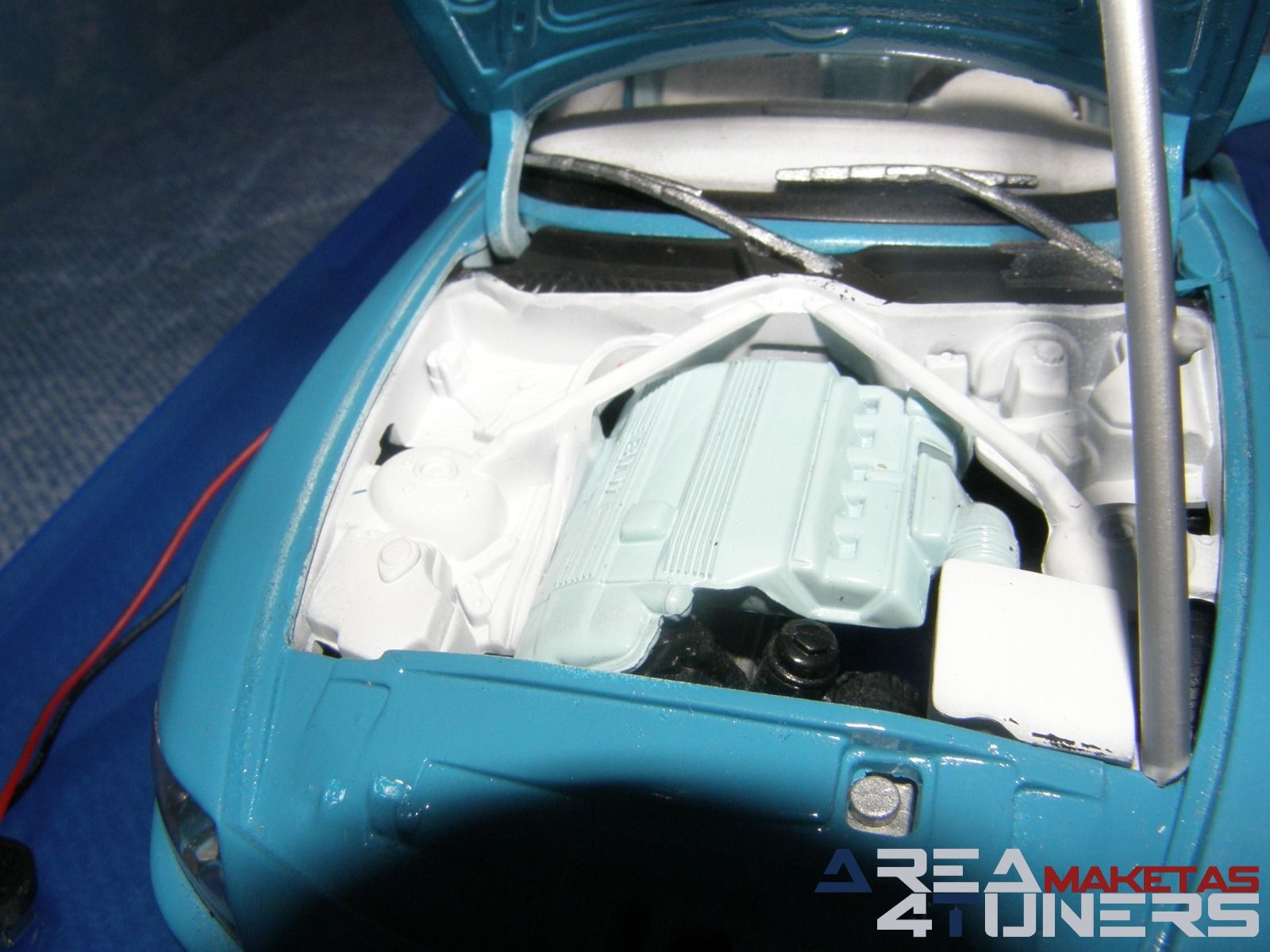 Reportaje maqueta Tuning Bmw Z4 Smurf Style Imagen perteneciente al reportaje fotográfico de la revista Tuning de publicación diaria Area4tuners.es sobre una maqueta Tuning 1:18 Bmw Z4 Cabrio