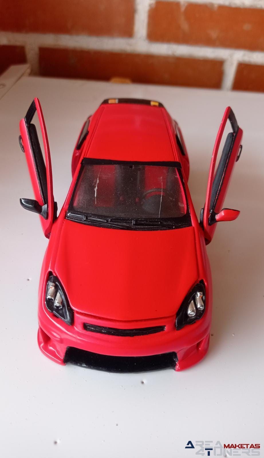 Reportaje maqueta Tuning Opel Astra Astru Imagen perteneciente al reportaje fotográfico de la revista Tuning de publicación diaria Area4tuners.es sobre una maqueta Tuning 1:24 Opel Astra